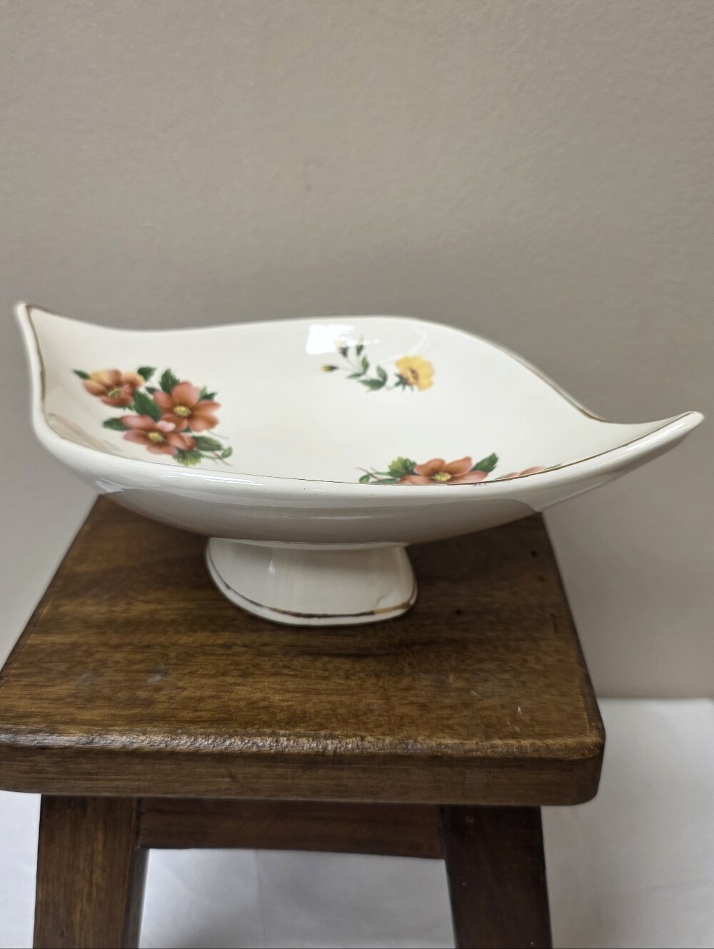 Vintage White Ceramic Pedestal Bowl with Pink and Yellow Floral Design
